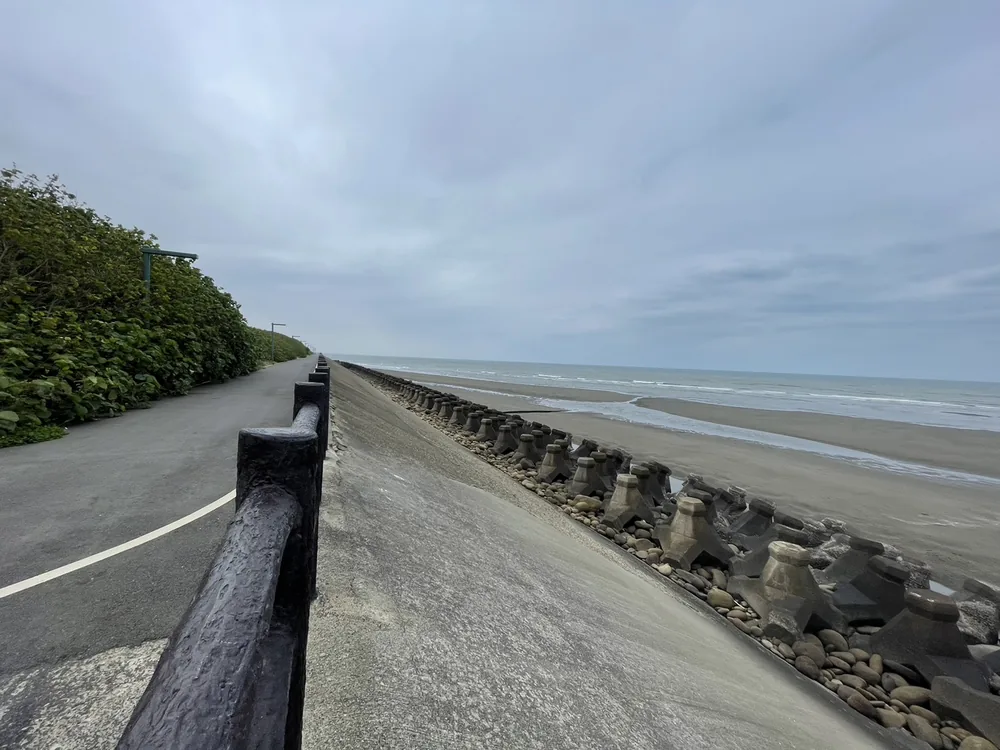 Seawall and armour units on the Hsinchu coast under an overcast sky
